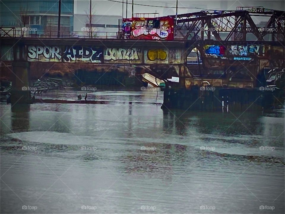 “Newtown Creek” towards the “Borden Ave Bridge”, a small overpass crossing a sidearm of the creek at “Dutch Kills”. The Dutch settled this area first and “Kills” means “Small Stream”. 2022. Hypnotic Productions