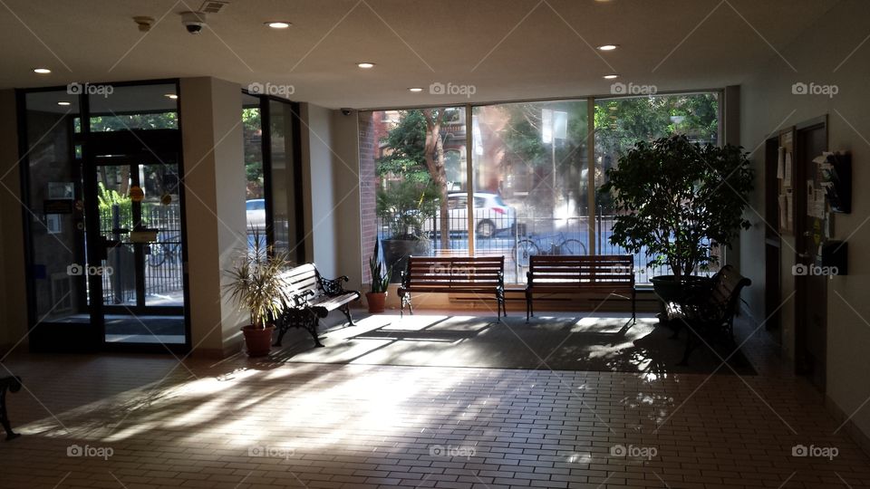 apartment lobby in early morning sunlight