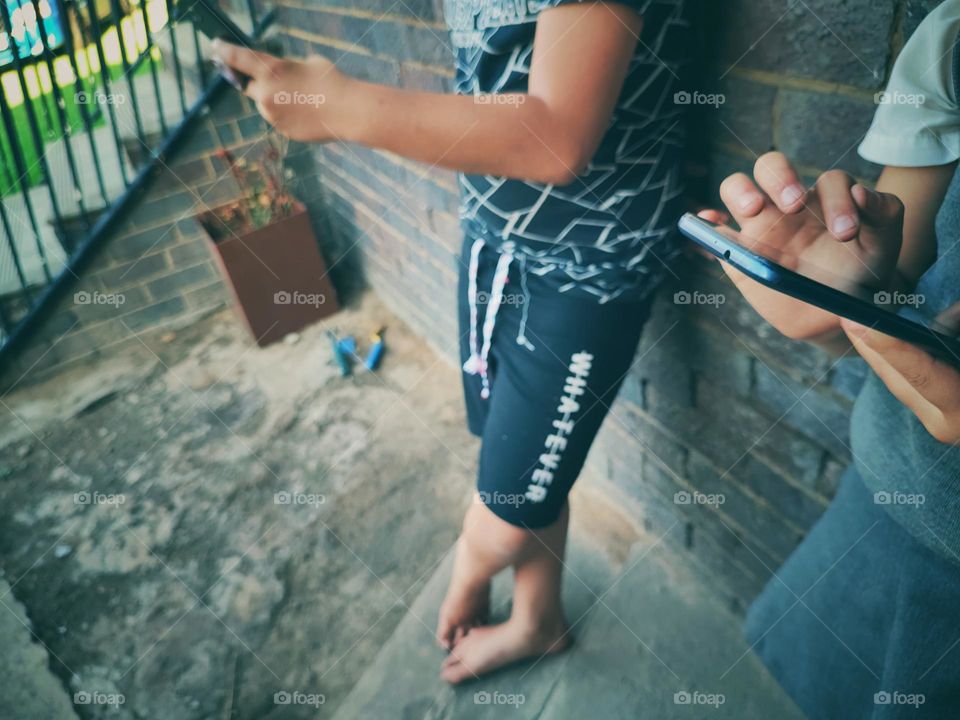 Children on their phones