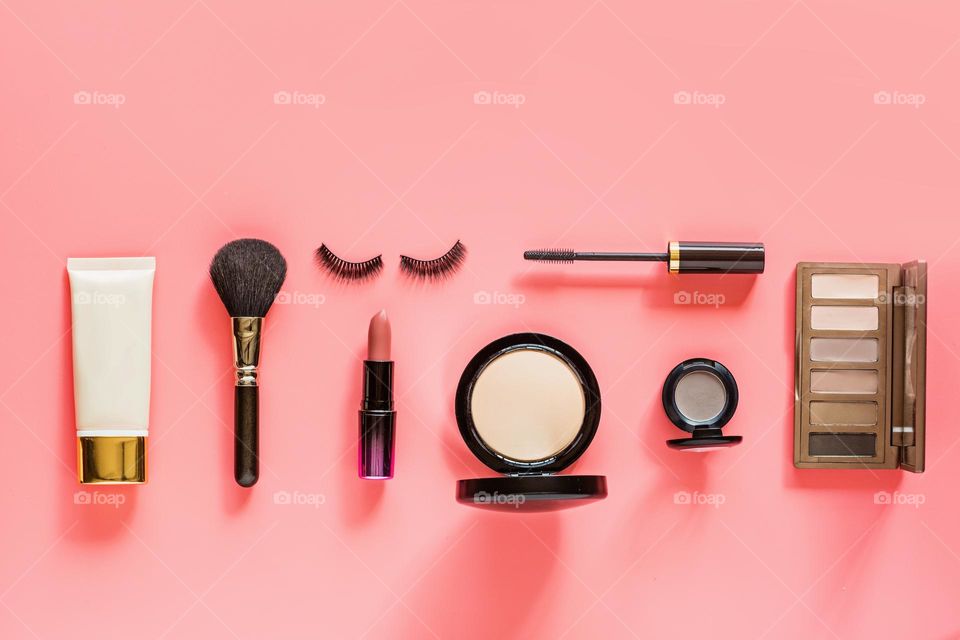 Makeup products flat lay 