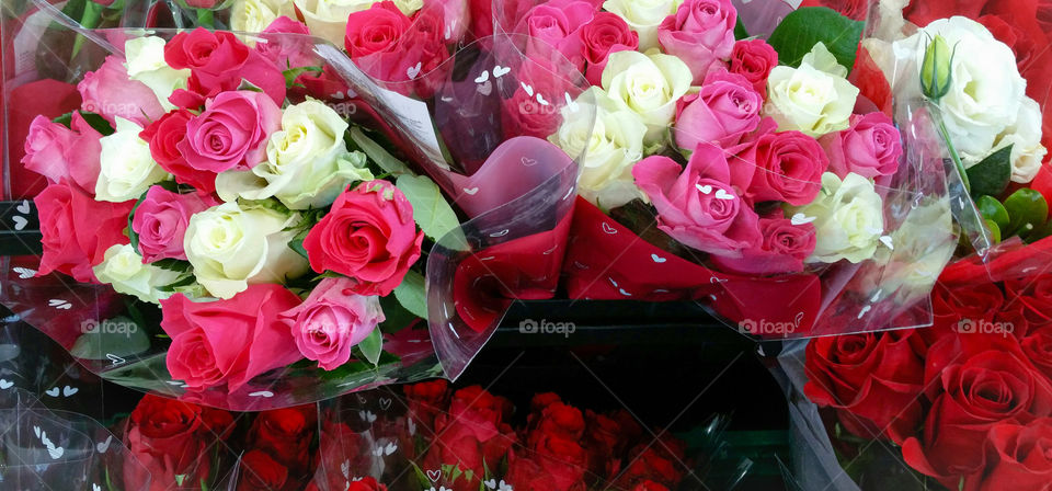 Valentine rose bouquet display in a sho