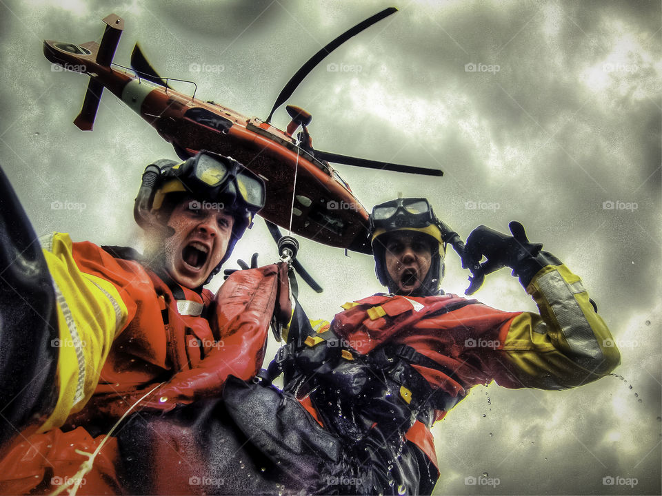 Last Flight of A Hero. Myself and a mentor, both Coast Guard rescue swimmers. This was his final flight before retirement. Having some fun.