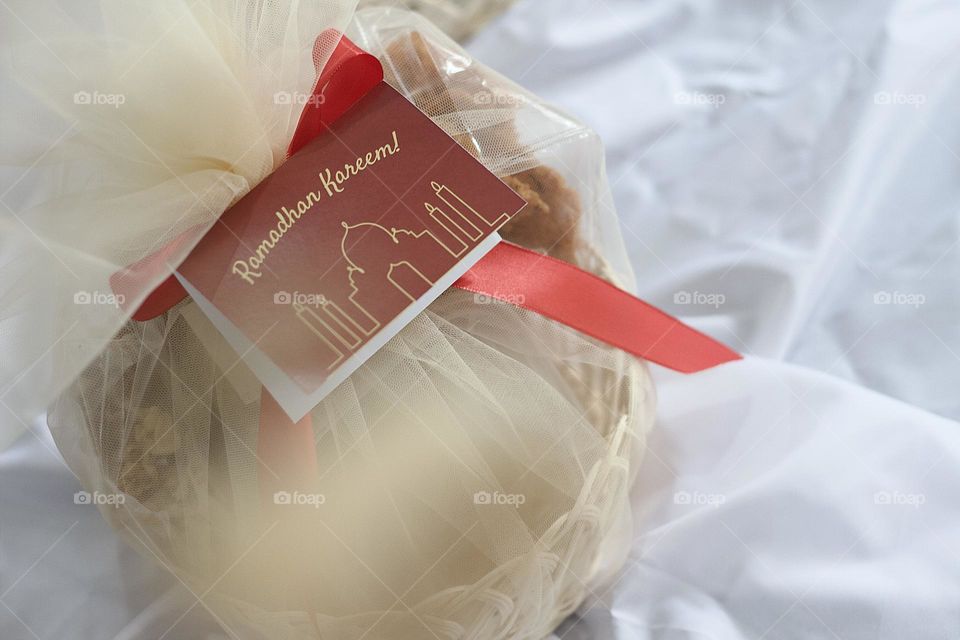 Ramadhan hampers with greetings card and red ribbon. Usually celebrated by the Moslem/Muslim community around the world.