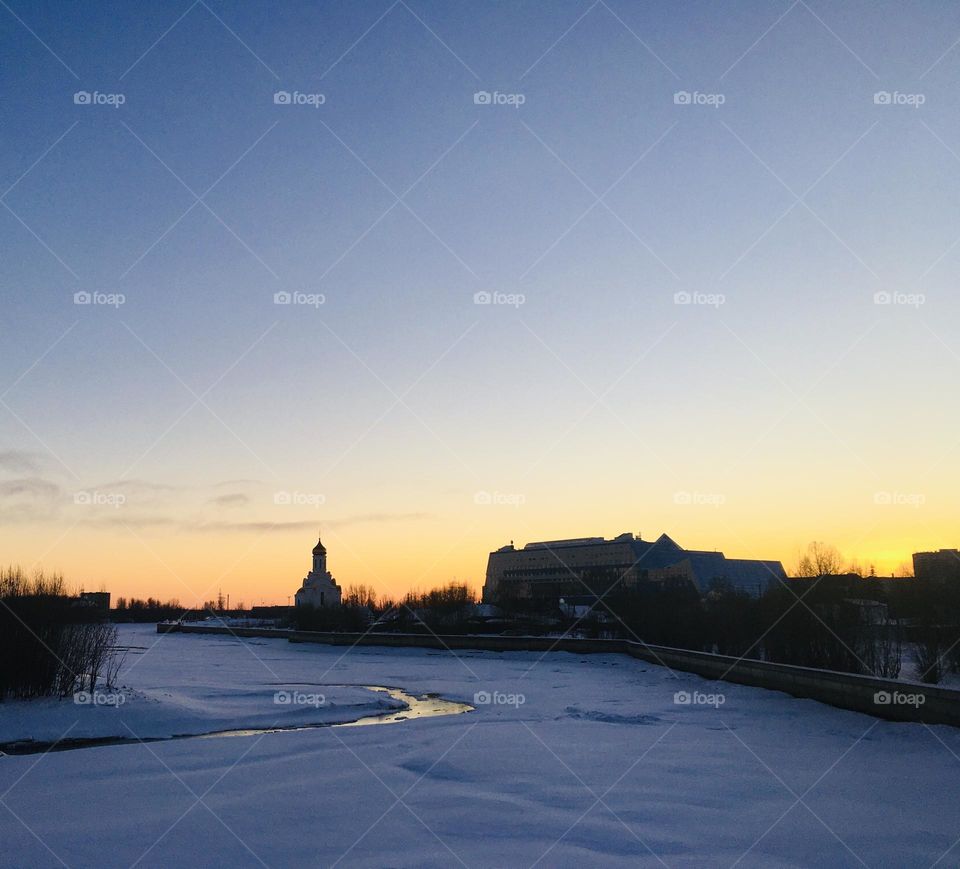 Snowy landscape during the sunset 