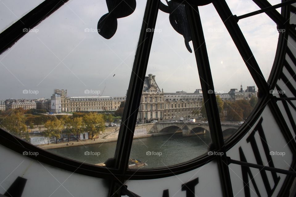 View from above over Paris from inside a clock tower 
