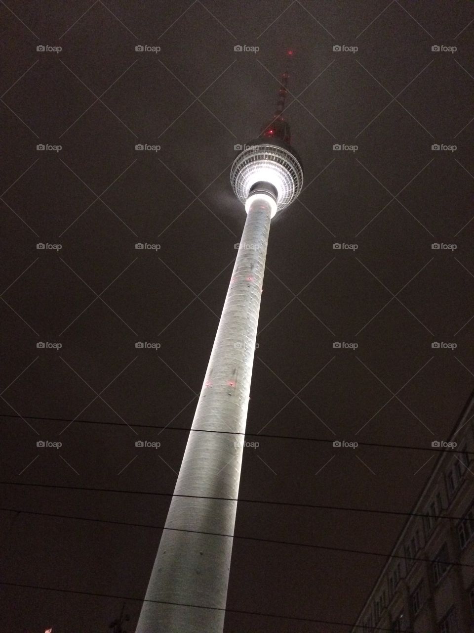 Berlin's TV tower on a foggy night