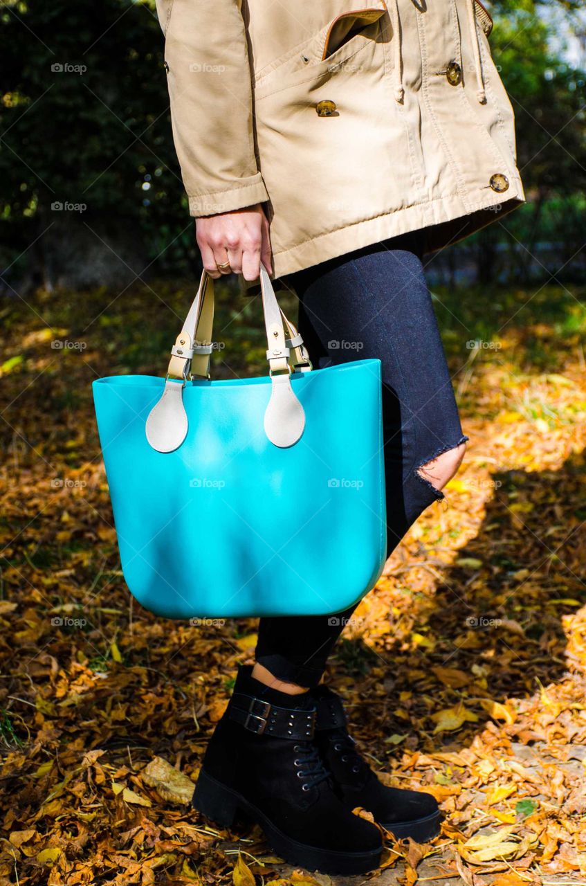 Girl with bag in the hand