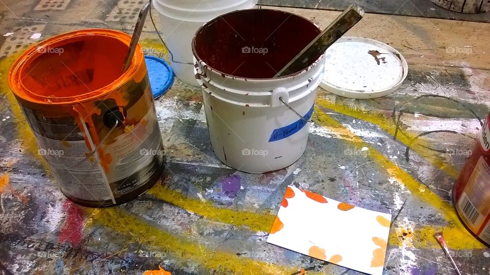 Mixing paints.