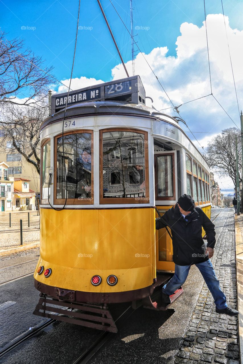 Hopping of the historical tram, in Lisbon's old town