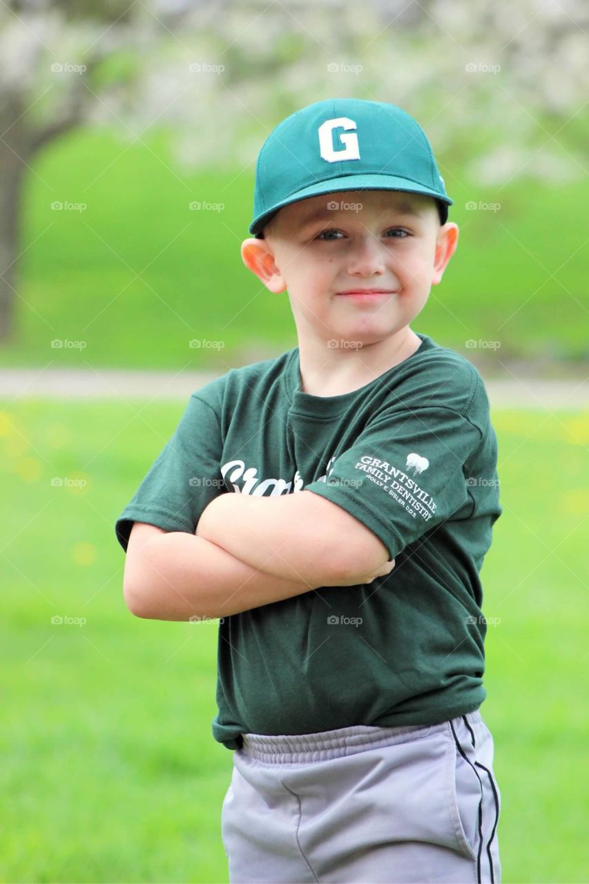 My handsome little T-ball player dressed and ready to play his first T-ball game of the season. 
