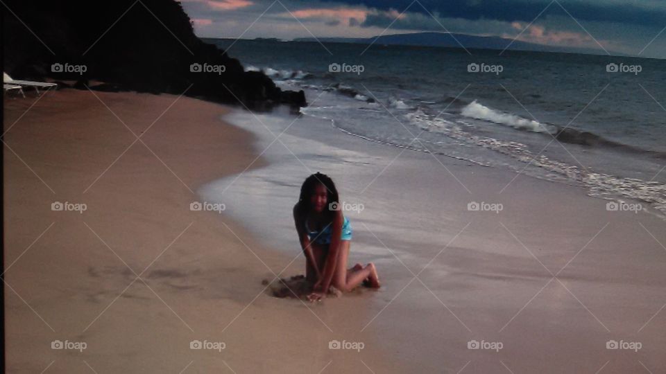 My precious / wet sand. In maui on vacation with my daughter