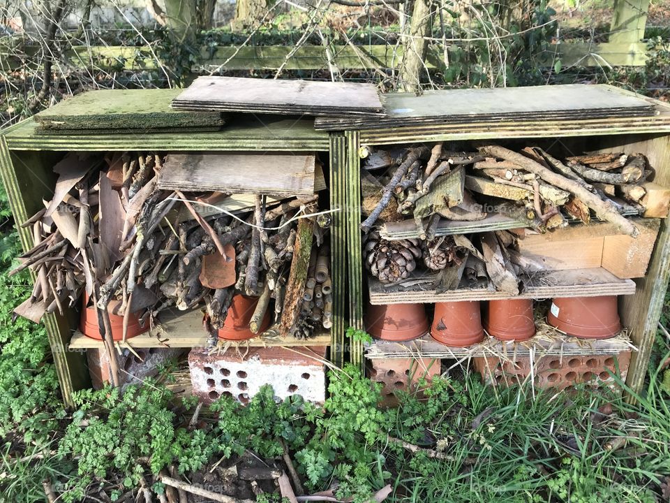 Rather like a miniature tool shed, packed with bits and pieces for the countryside garden.