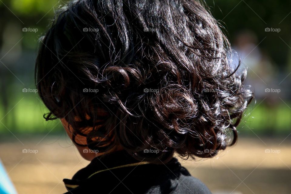 Fantastic curly healthy dark hair