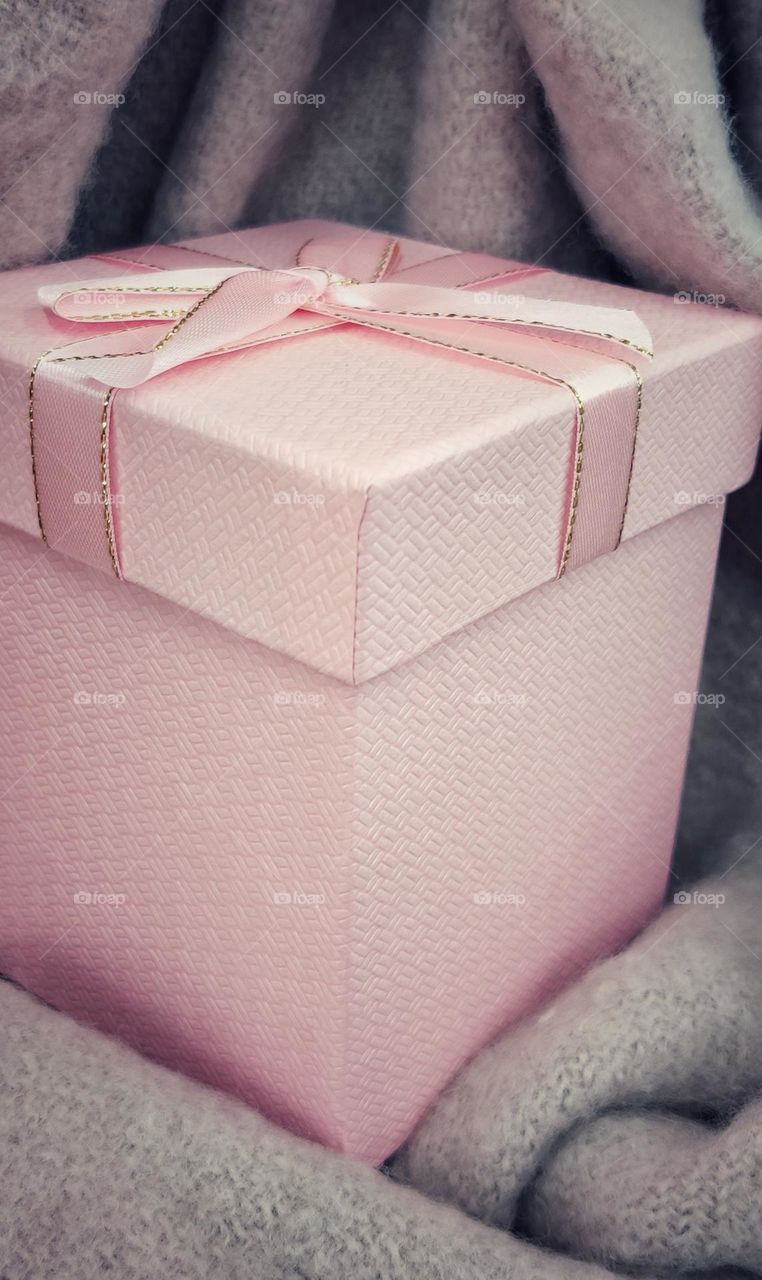 pink box with a bow