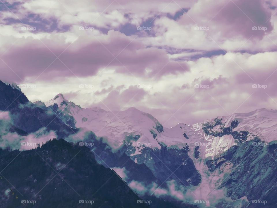 a cloudy mountain view