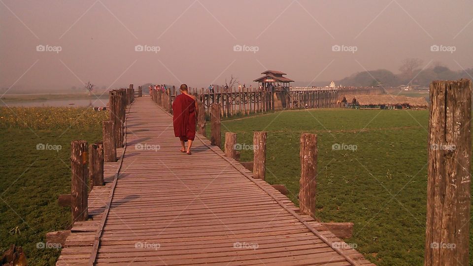 Crossing the Bridge. The Buddhism is the most peaceful religion in this mayhem world