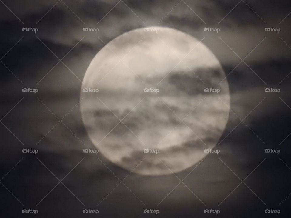 Full Moon Behind Clouds
