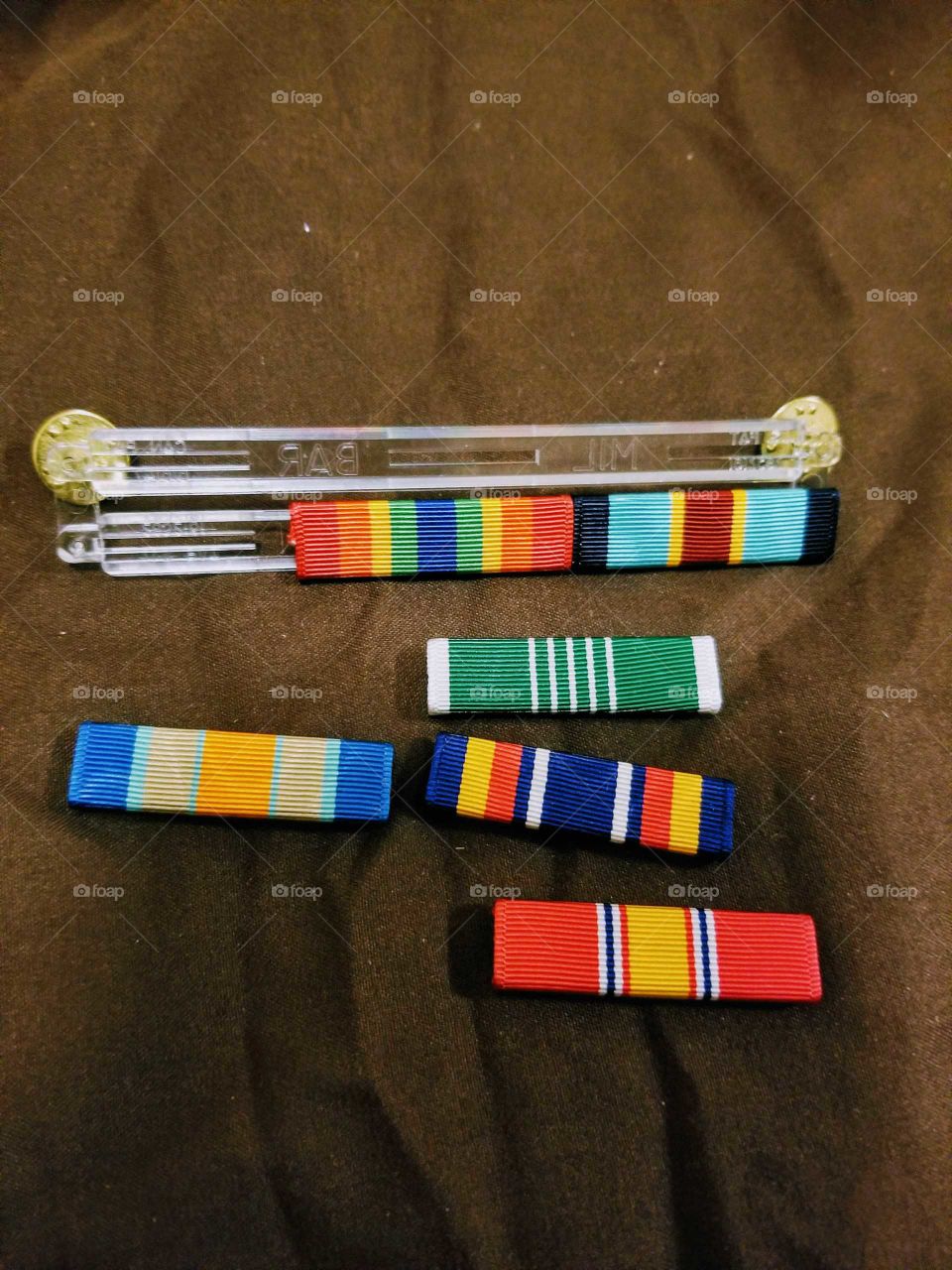 Plastic six ribbon rack for military ASU's