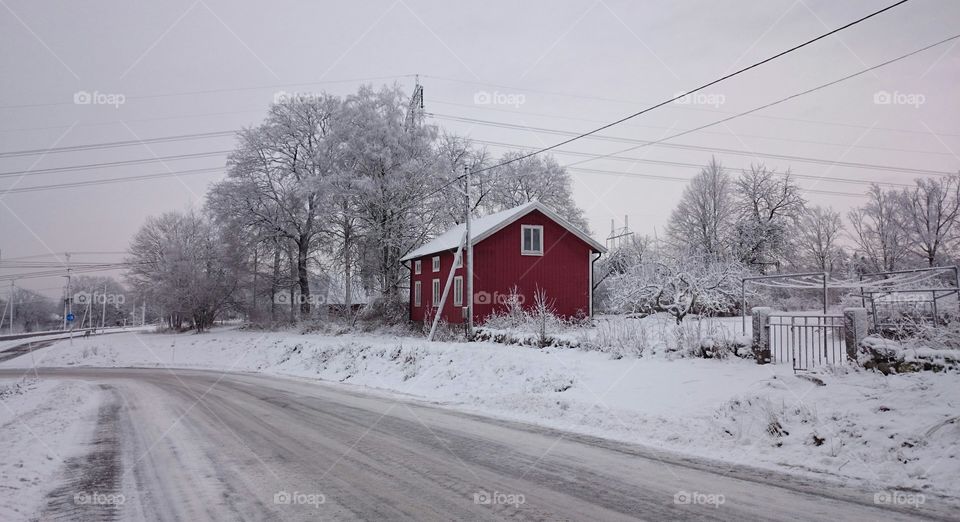 Red house in the snow