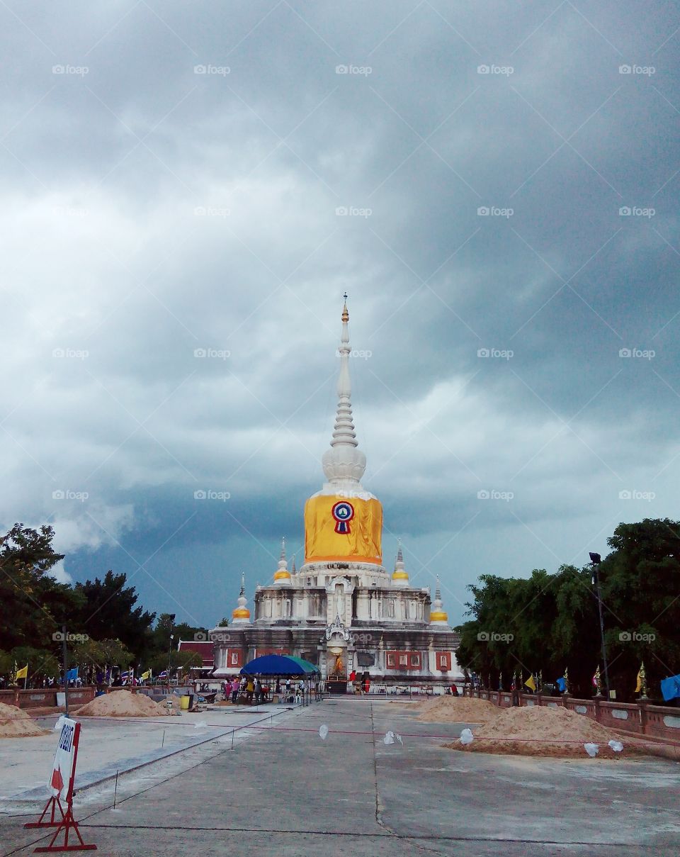White pagoda, Phra That Na Dun, landmark in Mahasarakham province, Thailand.