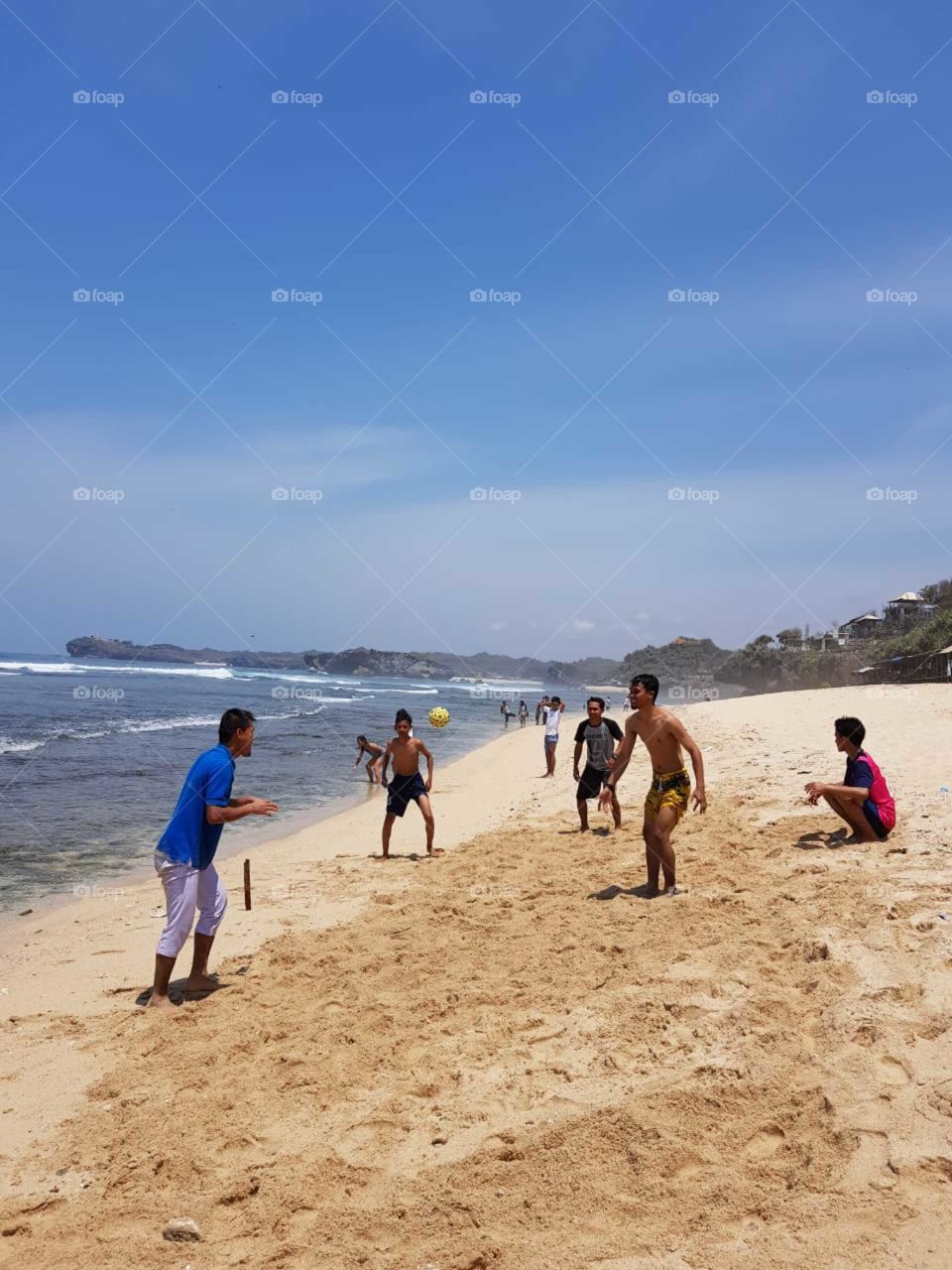 takraw ball at the beach