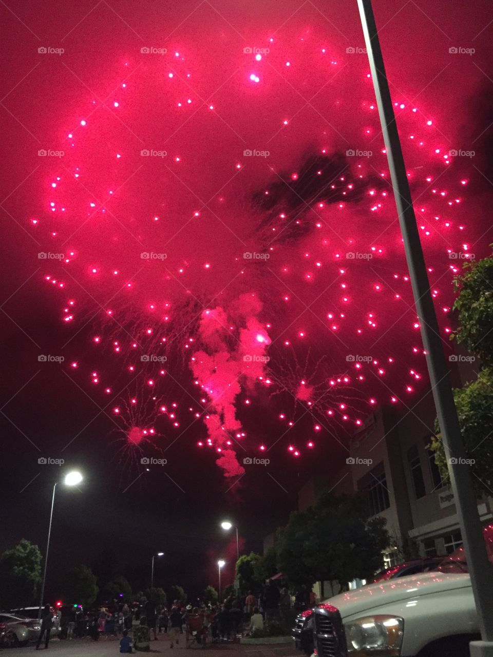 Red firework in the sky. 4th of July giant red firework