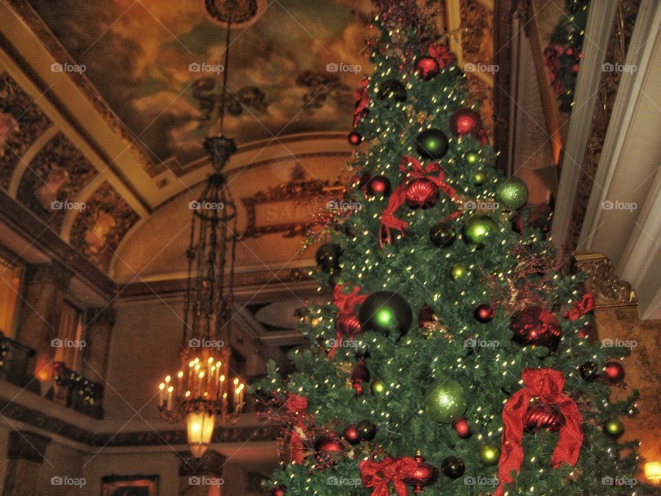 Holiday. Beautiful Christmas Tree in Historic Hotel