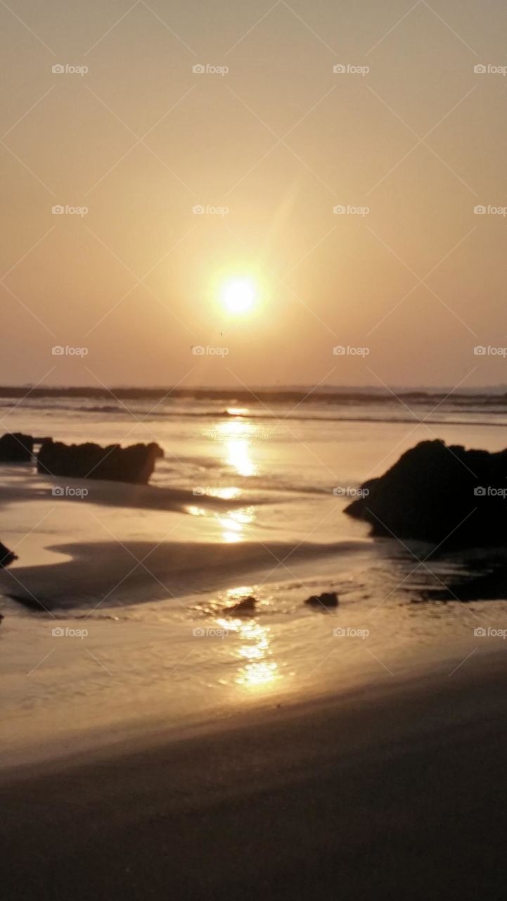 magic and splendid sunset between rocks.