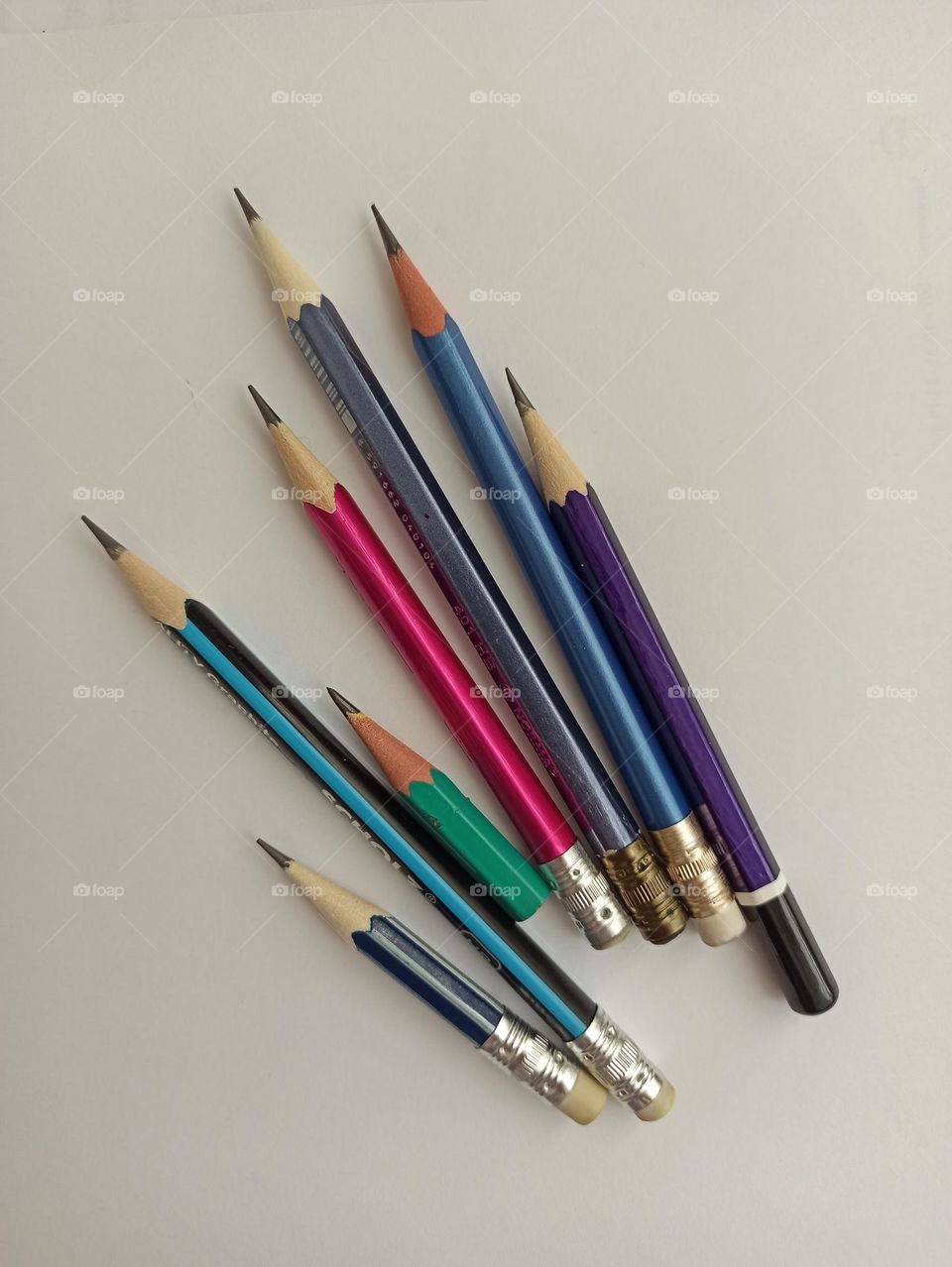 permanent pencils of different sizes