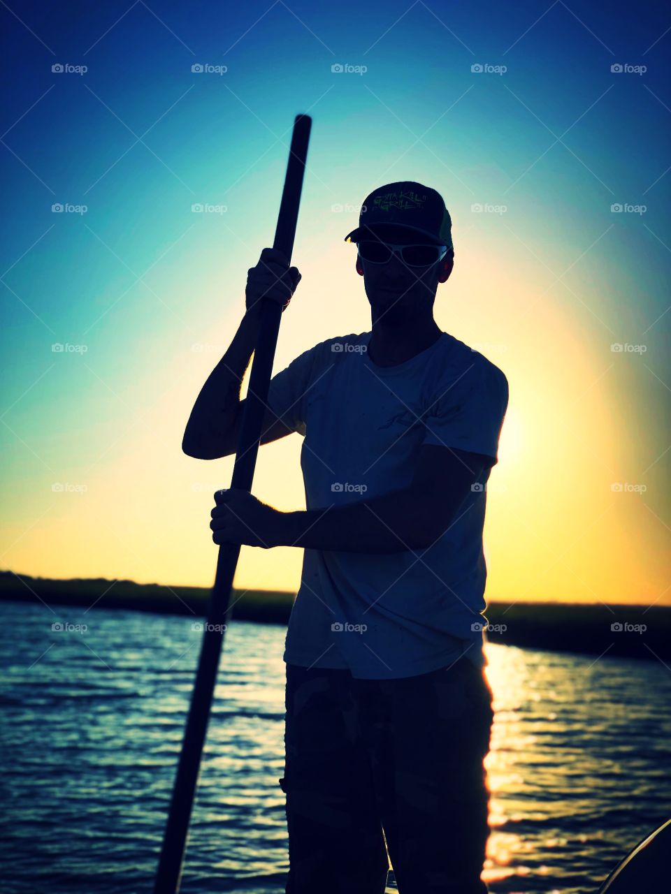 Pole driving in the boat on low tide 