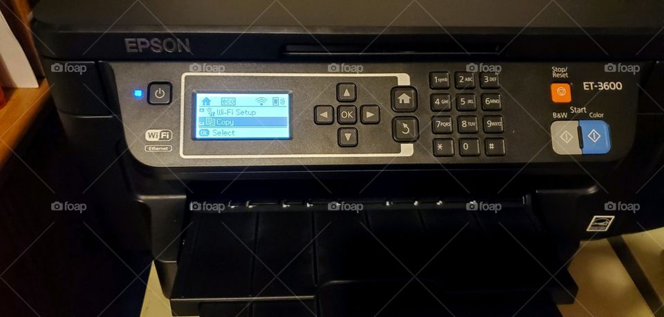 Printer & Scanner combination control buttons for setting details of jobs to do. Push buttons and touch screen panel on front of unit.