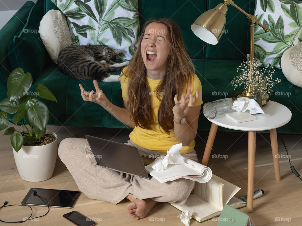 Stressed woman working at home