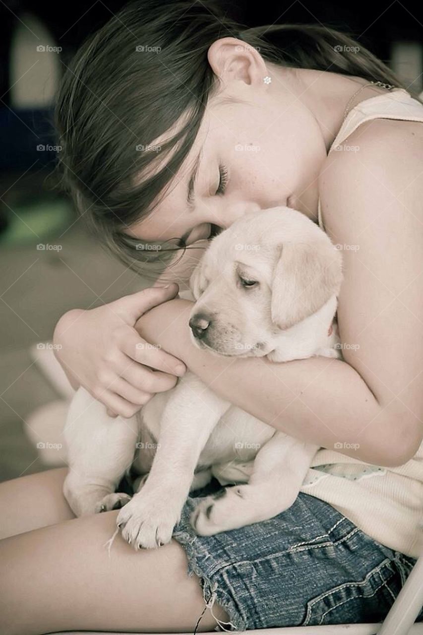 A girl and her puppy