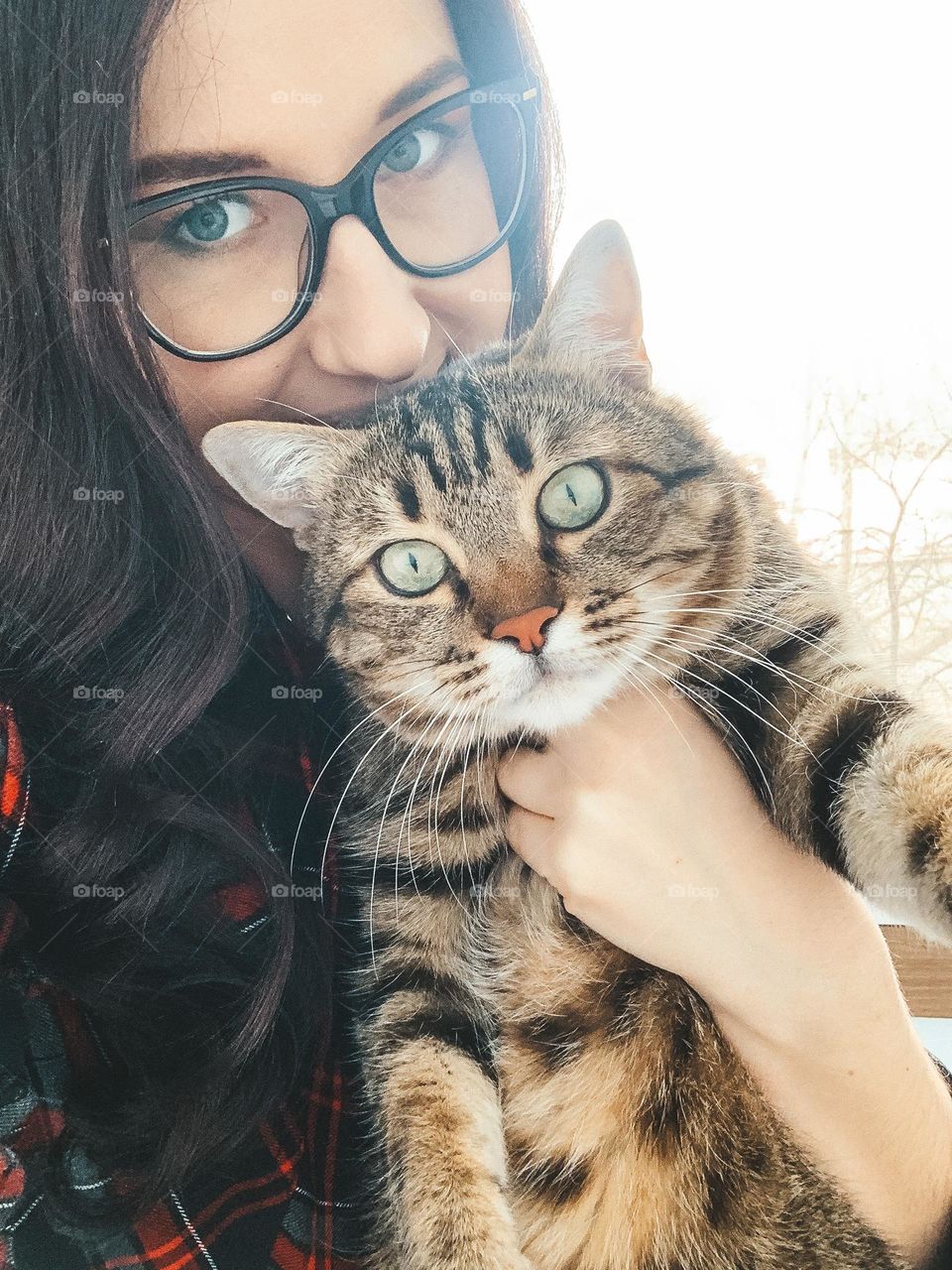 Girl with cat. Selfie photo 