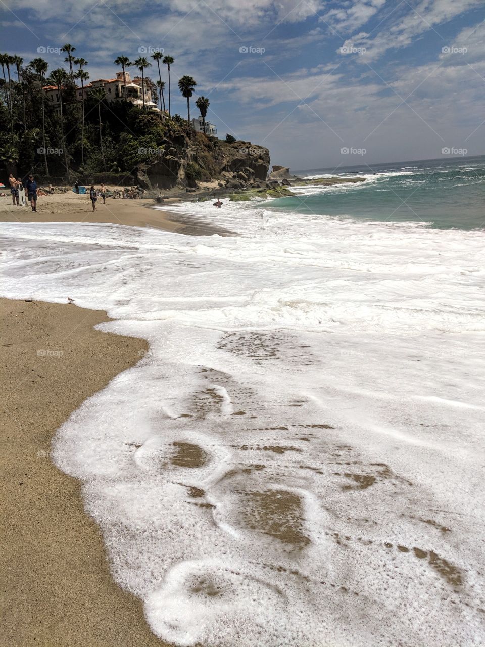 Exotic Southern California Aliso Beach with Sea Foam.  Fun in the Sun!