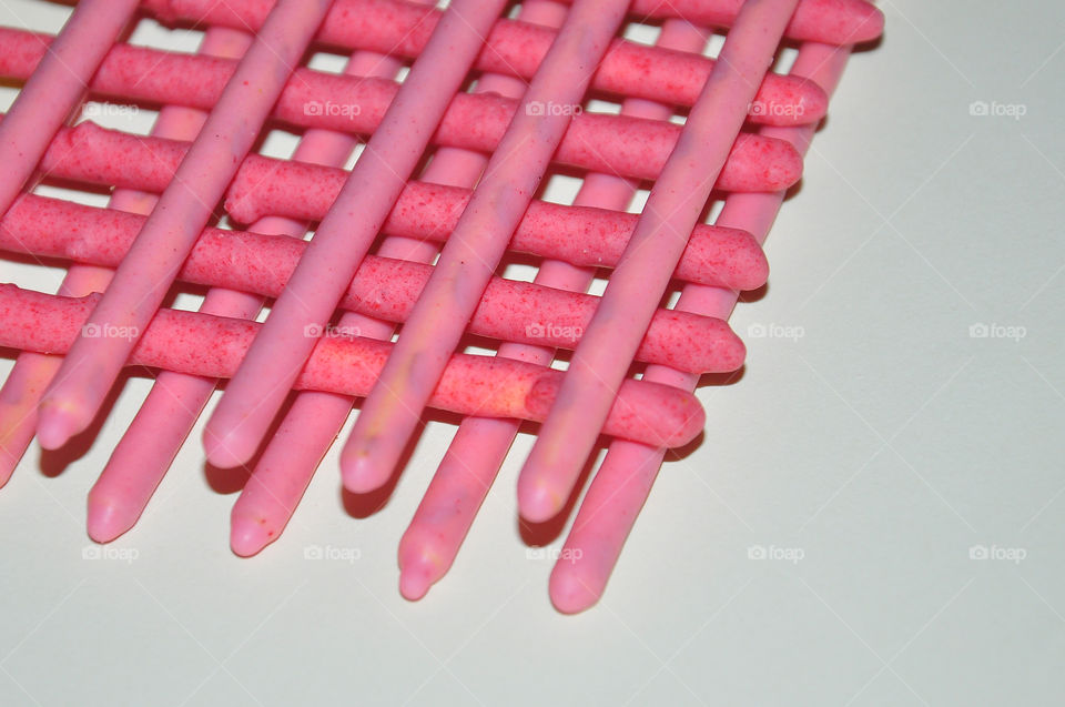 Strawberry cream covered biscuit sticks