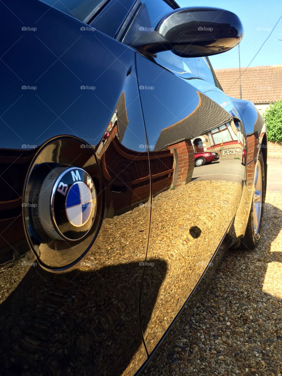 Black BMW Z4 Polished. Freshly polished black BMW Z4 convertible on sunmers day.