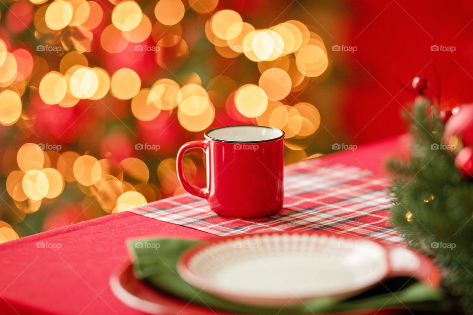 cup of coffee in a cozy festive Christmas atmosphere