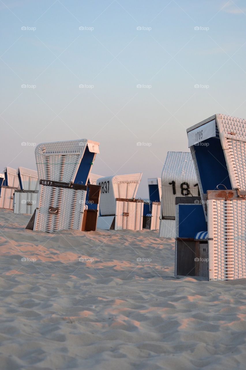 Hooded beach chair on sand