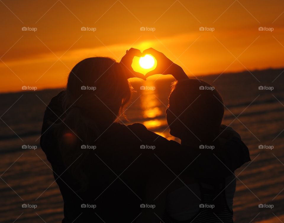 Sunset Silhouetted in Love