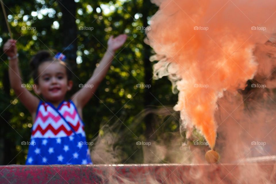 Jayda's favorite color. . 4th of July, and Jayda was excited for her favorite color smoke ball.