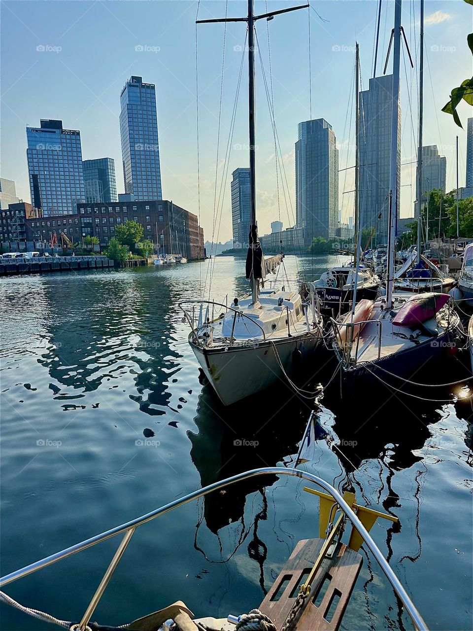 This is beautiful “Newtown Creek” by the “Pulaski Bridge” in LIC, Queens at sunset time seen from aboard “Salvation”, the “28 ft 1969 Luhrs” cabin cruiser that I and my partner “Timothy Trespas” call home. 2024. Hypnotic Productions