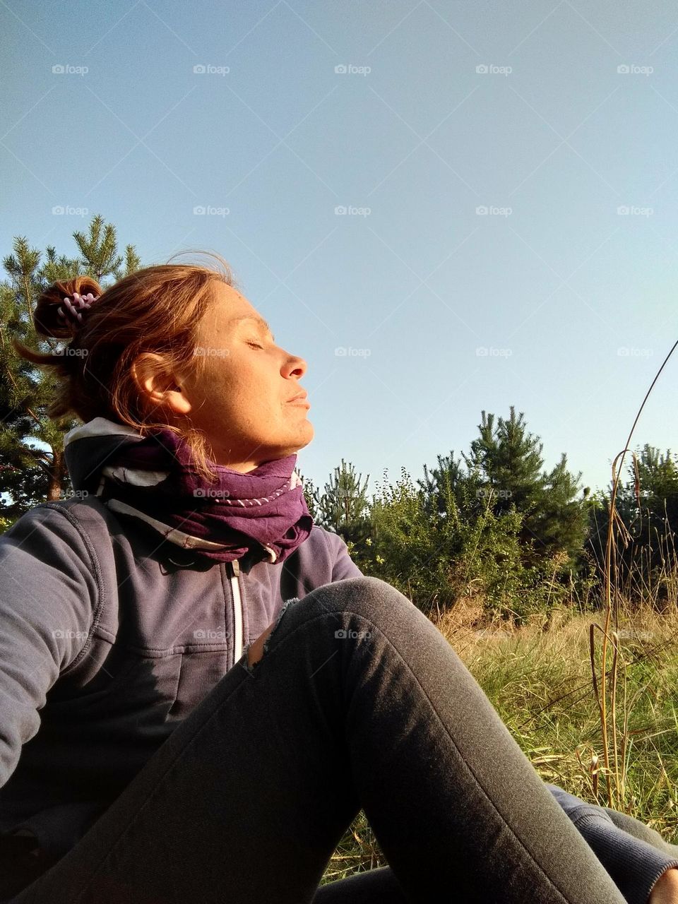 woman relaxing outside, happiness