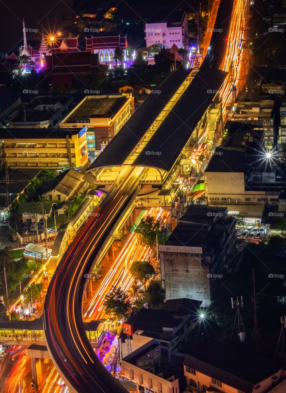 Vehicle light show beautiful line at Pak Nam BTS Station , Thailand 