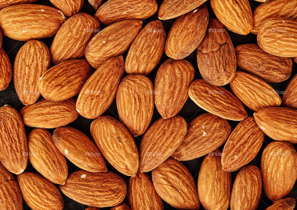almonds close-up background.  delicious nut