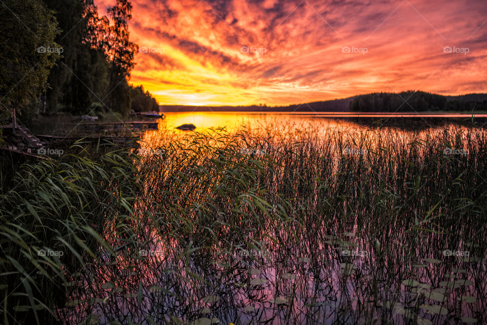 Colorful sunset by a lake