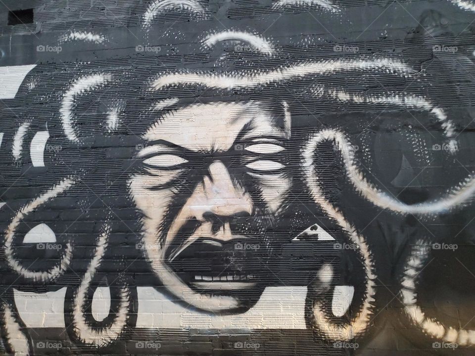 Medusa street art - symbolic of rage and anger.