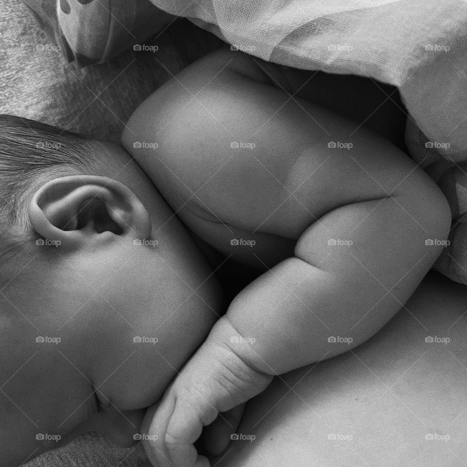 Black and white photo of newborn baby 