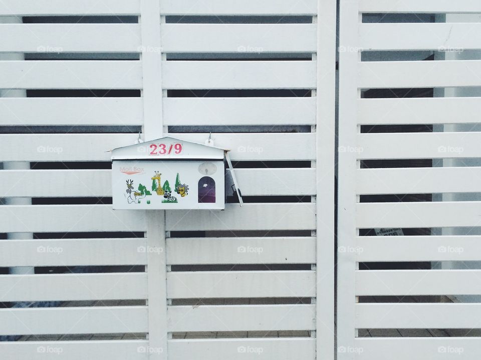 Minimal white mailbox