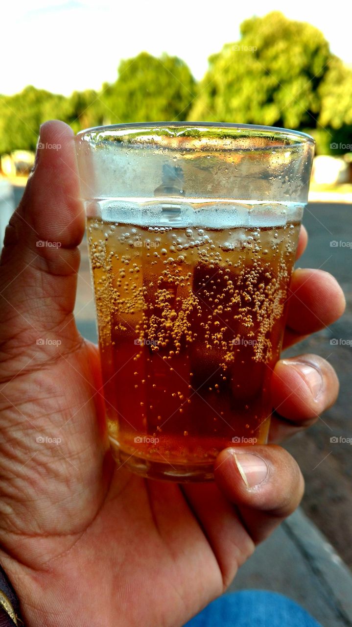 Copo com refrigerante.